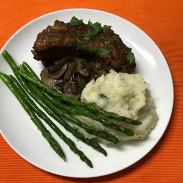 asian spare ribs with asparagus and mashed potatoes