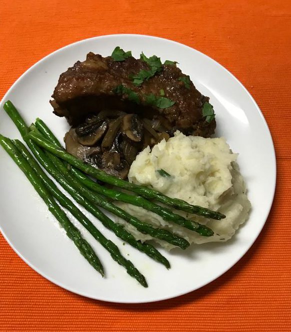 asian spare ribs with asparagus and mashed potatoes